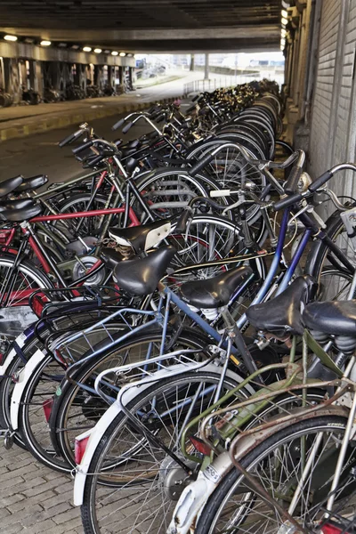 Holland, Amsterdam; 9 October 2011, bicycles parking in a tunnel near the Central Station - EDITORIAL