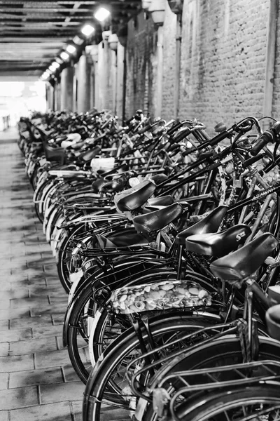 Holland, Amsterdam; 9 October 2011, bicycles parking in a tunnel near the Central Station - EDITORIAL