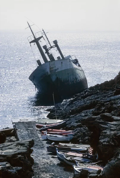 Italy, Sicily, Pantelleria Island (Trapani Province), the wreck of a cargo ship ans some fishing boats - FILM SCAN