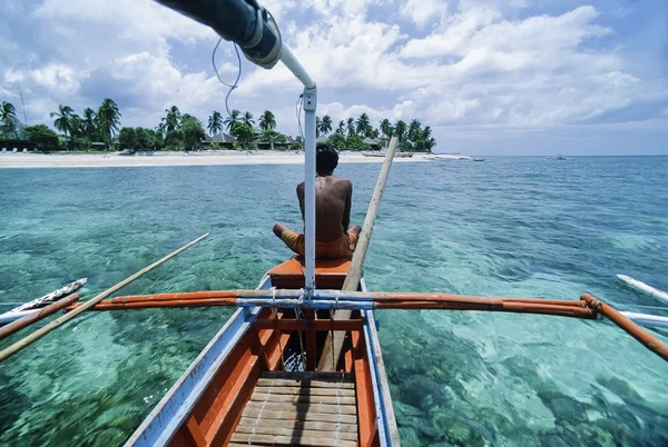 PHILIPPINES, Balicasag Island (Bohol), fisherman on his banca (local wooden fishing boat) - FILM SCAN