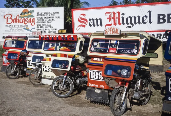 PHILIPPINES, Bohol Island; 18 March 2000, local taxi cabs (tuk-tuk) near the airport - EDITORIAL (FILM SCAN)