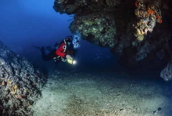 Diver in a cave