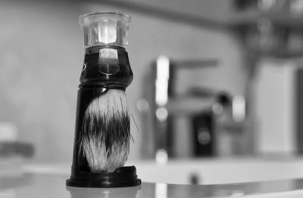 Shaving brush in a bathroom