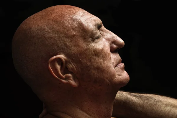 Portrait of a bald old man