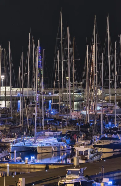 Italy, Sicily, Mediterranean sea, Marina di Ragusa; 15 December 2015, luxury yachts with Christmas lights in the marina at night - EDITORIAL