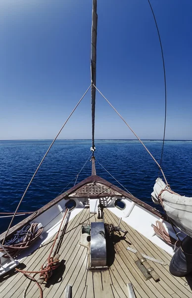 SUDAN, Red Sea, Sanghaneb Reef, view of the coral reef from a wooden sailing boat - FILM SCAN