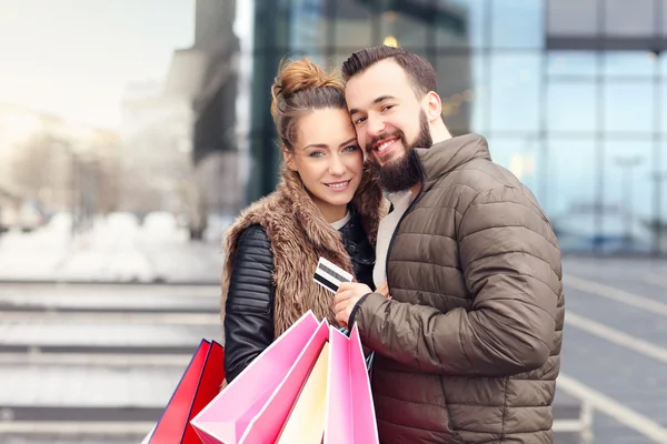Couple shopping with credit card