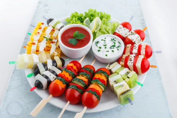 Assortment of fruit and vegetable appetizer with dips