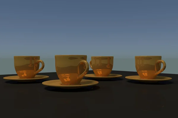 Four golden coffee cups with saucer on a table