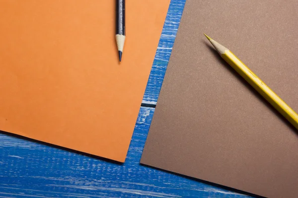 Top View of Creative Writing Concept With Pencils, Colorful paper on Wooden Table. Copy space for text