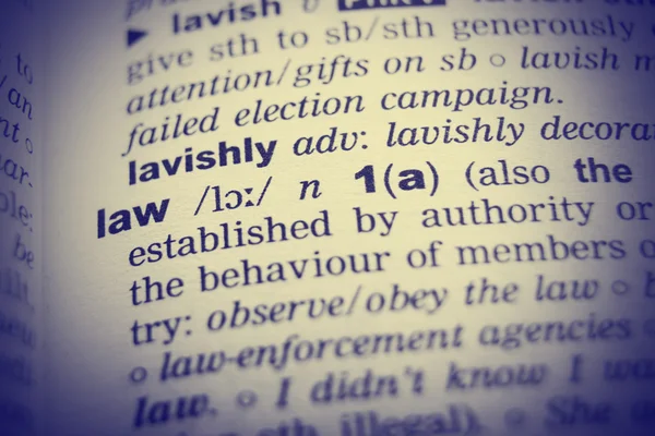 Dictionary definition of the word Law with vignetting effect.