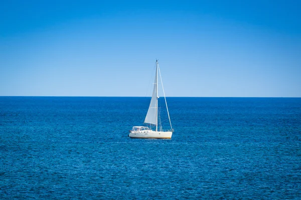 Small sailboat on the ocean