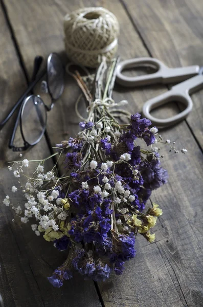 Dried flowers on an old table