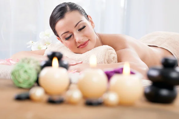 Young beautiful woman in the spa salon