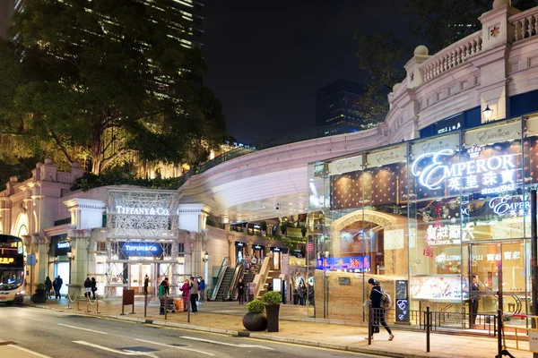 Luxury elite stores on streets of night city Hong Kong