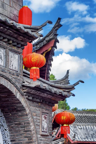 Facade of traditional Chinese building decorated with lanterns