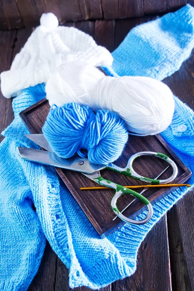 Blue knitting on a table