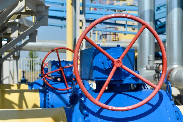 Red handle gate valve with steel pipe on gas compressor station