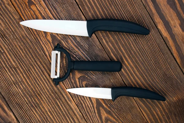 Ceramic Knife Set against the backdrop of a dark table.