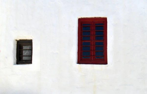 Red windows on a white building