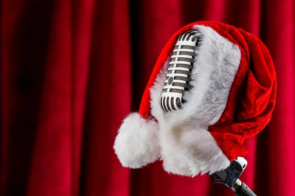 Retro microphone with santa hat