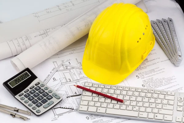 House plan with a construction worker helmet