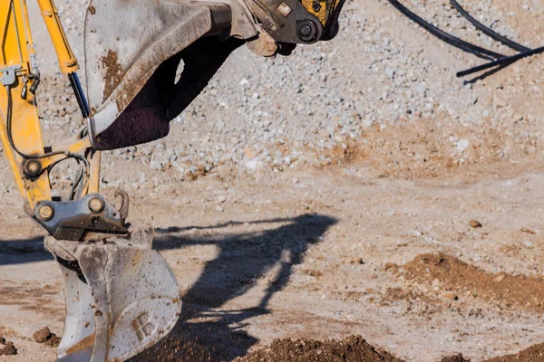 Excavator at construction site during excavation