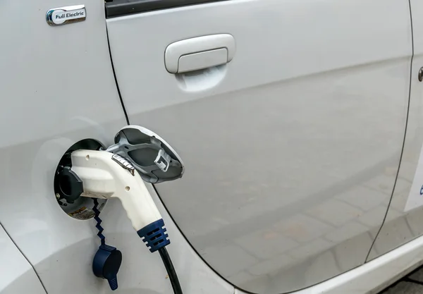 Electric car charging station to