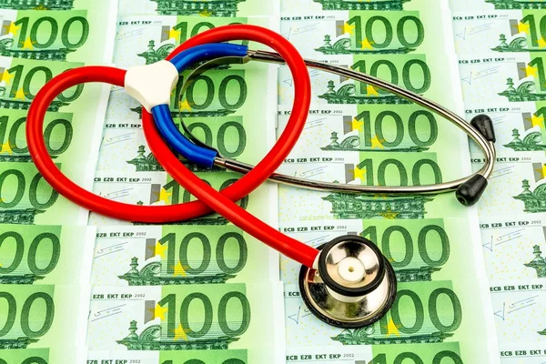 Stethoscope and euro banknotes