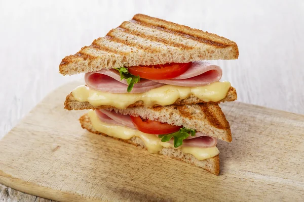Toast sandwich grilled ham with cheese and tomatoes