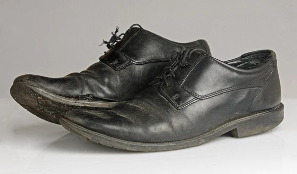 Worn and dirty blackshoes