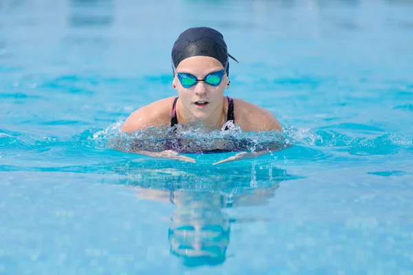 Girl swimming butterfly stroke style