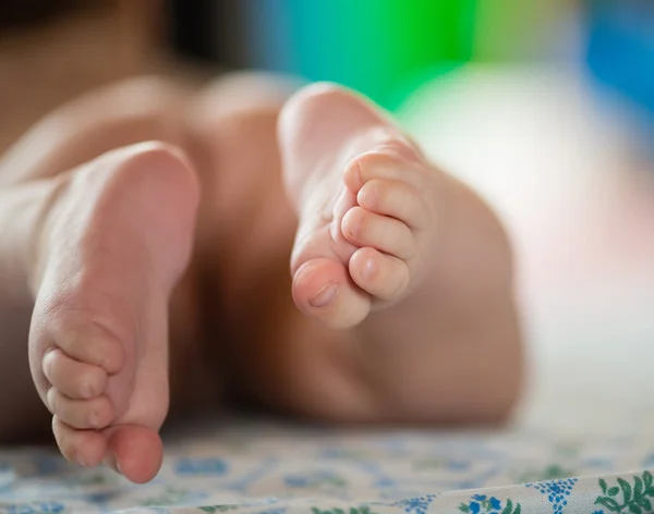 Close-up of tiny baby feet