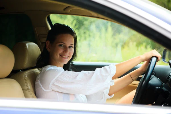 Beautiful Woman sitting inside the car