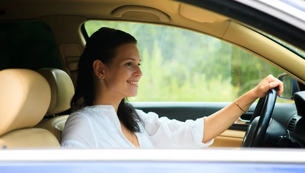 Beautiful Woman sitting inside the car