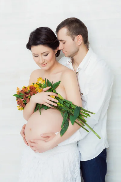 Portrait of husband and pregnant wife