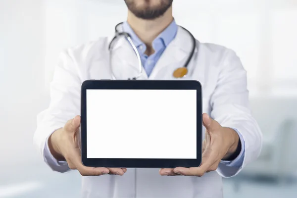 Doctor showing digital tablet with blank white screen