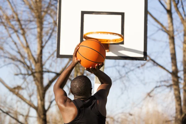 Street basket player playing outdoors