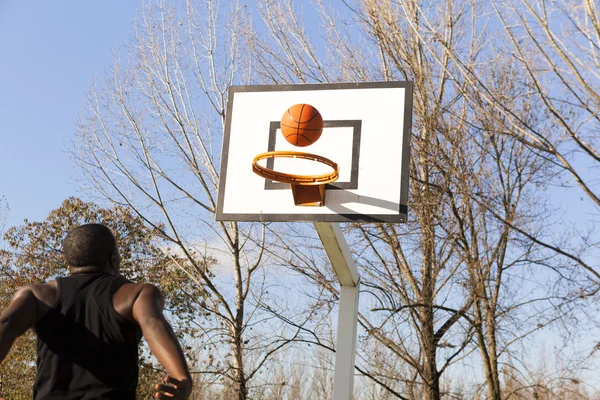 Street basket player playing outdoors