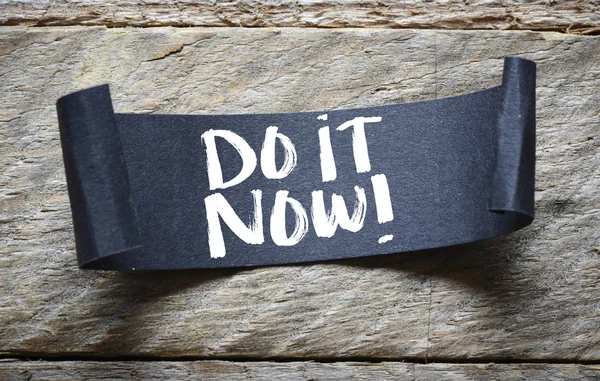 Paper sheet with Do it now! text