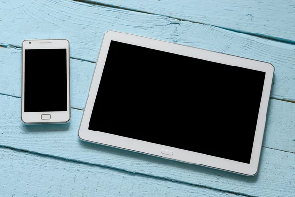 White Tablet and Smart phone.