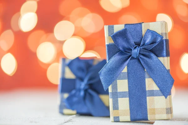 Presents with blue ribbons