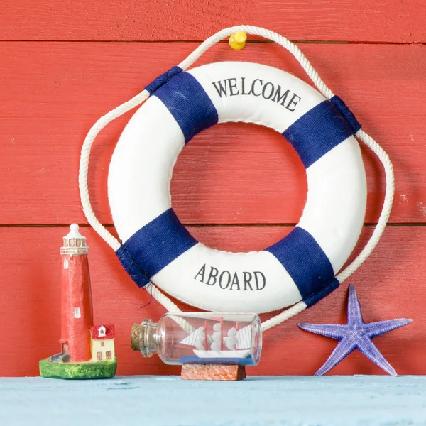 Lifebuoy on wooden background