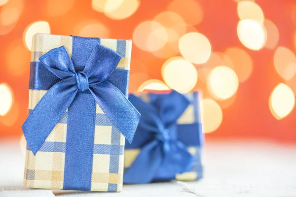 Presents with blue ribbons