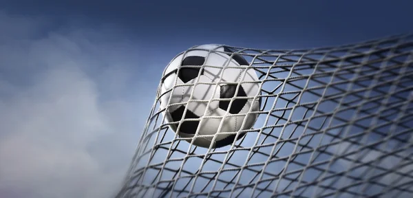 Photo of soccer ball in a goal