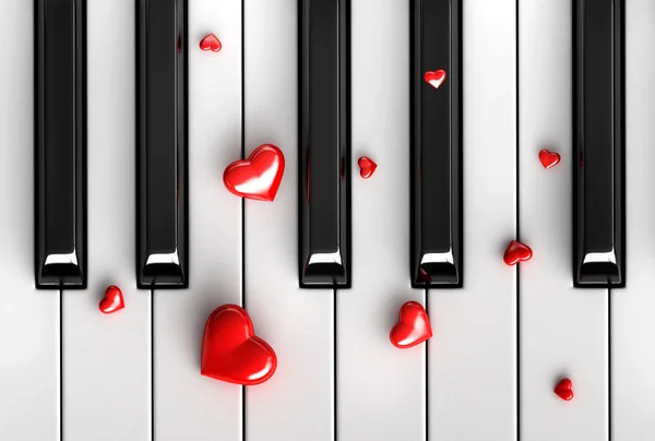 Red heart over piano keys