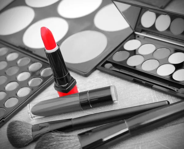 Lipstick makeup  brushes make-up eye shadows black and white photo red vintage retro.