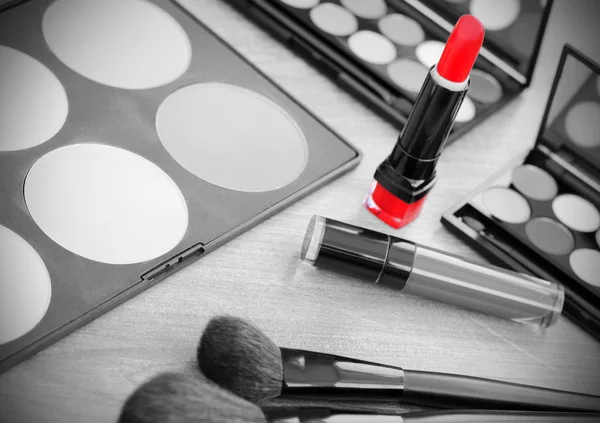 Lipstick makeup  brushes make-up eye shadows black and white photo red vintage retro.