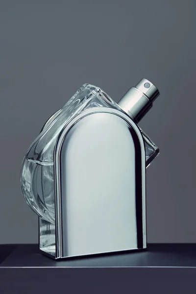 Perfume in a metal bottle