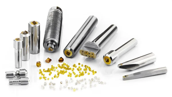 Synthetic and natural diamonds tools fixed in different metal ho